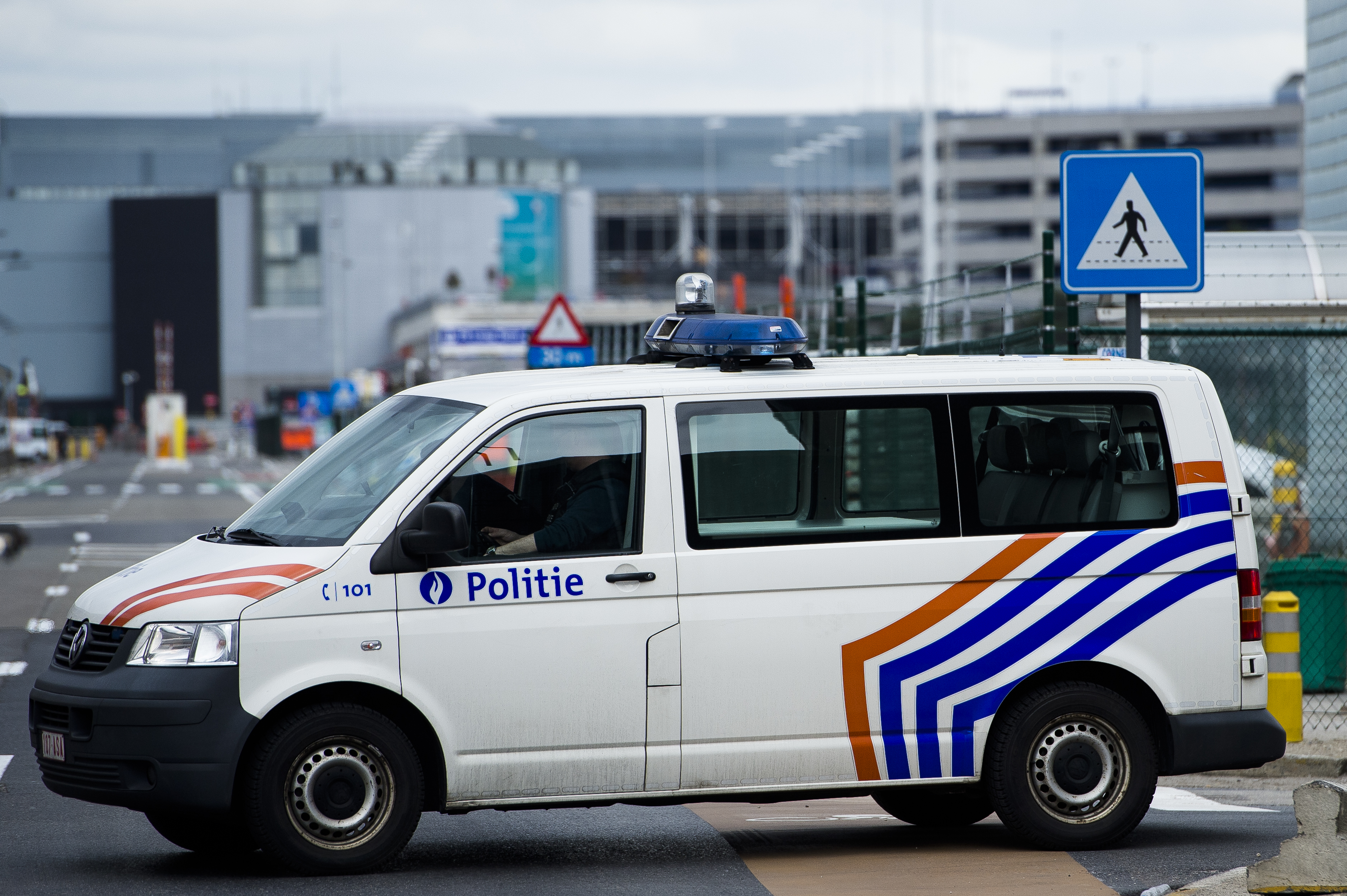 Illustration picture shows police officers at the entrance of Brussels Airport, in Zaventem, Wednesday 30 March 2016. In the morning of Tuesday 22nd of March two bombs exploded in the departure hall of Brussels Airport and another one in the Maelbeek - Maalbeek subway station, which made around 32 deadly victims, not including the suicide bombers, and 340 injured people in total. ISIL (Islamic State of Iraq and the Levant - Daesh - ISIS) claimed responsibility for these attacks. BELGA PHOTO LAURIE DIEFFEMBACQ