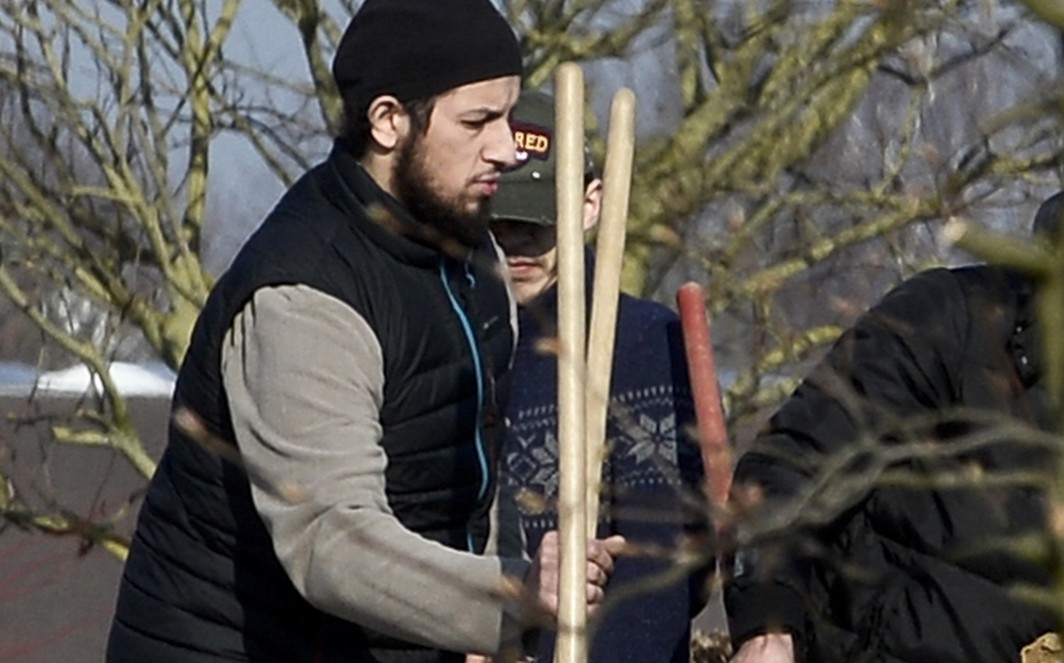 Family and relatives, including Abid Aberkan (L) pictured at the funeral ceremony of Brahim Abdeslam, one of the terrorist of last November Paris attacks, at the interdenominational cemetery of Schaerbeek in Brussels, Thursday 17 March 2016. Brahim Abdeslam took part in the terraces attacks and committed suicide with a bomb at 'Le Comptoir Voltaire' in Paris. Abid Aberkan was arrested by police in Jette after the arrest of Salah Abdeslam in Molenbeek on Friday 18 March 2016. After Tuesday shooting in Vorst - Forest, Salah called Abid Aberkan who found a place to hide him, in his mother's house. BELGA PHOTO STRINGER