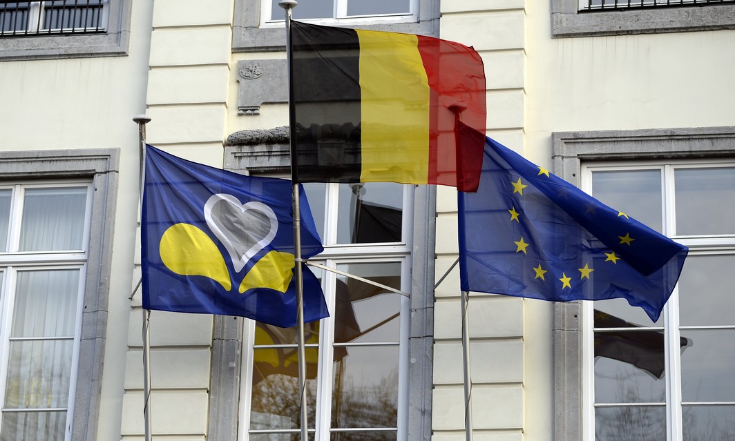 20150121 - BRUSSELS, BELGIUM: The flags of Brussels Region, Belgium and the European union pictured outside the cabinet of Brussels region Minister-President Vervoort at a meeting of Brussels Minister President with mayors of Brussels city, Schaerbeek - Schaarbeek, Molenbeek and Anderlecht to prepare a prevention plan against radicalism and for the living together, in Brussels, Wednesday 21 January 2015. BELGA PHOTO ERIC LALMAND