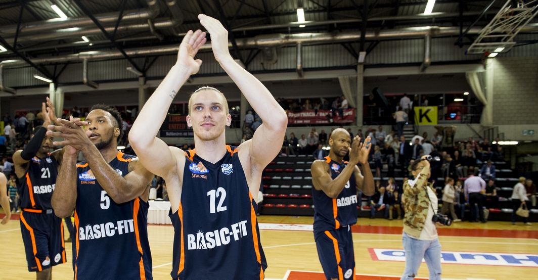 Brussels' Chris Dowe and Brussels' Augustas Peciukevicius celebrate after winning the basketball game between Limburg United and Royal Excelsior Brussels, the secondmatch (out of three) of the quarter finals of the play-offs of the EuroMillions League basket competition, on Friday 19 May 2017 in Hasselt. BELGA PHOTO JASPER JACOBS