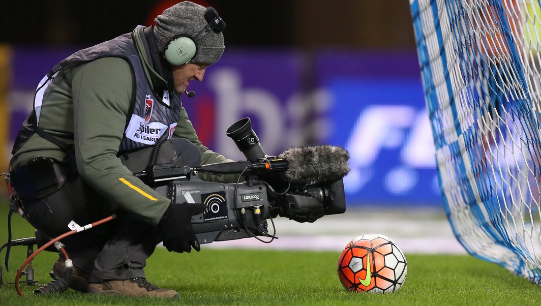 20151128 - GENK, BELGIUM: Illustration picture shows a cameraman in action during the Jupiler Pro League match between KRC Genk and KAA Gent, in Genk, Saturday 28 November 2015, on day 17 of the Belgian soccer championship. BELGA PHOTO BRUNO FAHY