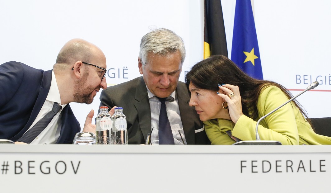 20151201 - BRUSSELS, BELGIUM: MR Belgian Prime Minister Charles Michel, CD&V Vice-Prime Minister and Minister of Employment, Economy and Consumer Affairs Kris Peeters and MR Minister of Energy, Environment and Sustainable Development Marie-Christine Marghem pictured during a press conference of the government and power companies Electrabel and Engie on the prolongation of the exploitation licenses for nuclear power plants Doel 1 and Doel 2, Tuesday 01 December 2015 in Brussels. The government and Electrabel reached an agreement to remain reactors Doel 1 and Doel 2 open until 2025. BELGA PHOTO THIERRY ROGE