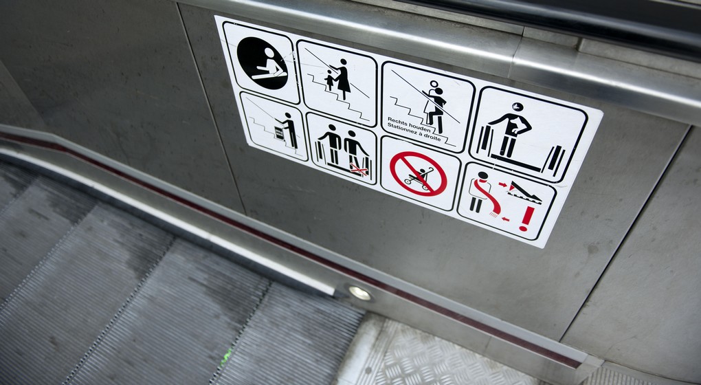 Illustration picture of a moving staircase in a metro station with security / safety instructions sticker
